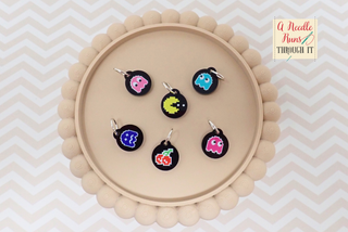 A Needle Runs Through It – Retro Arcade Stitch Markers